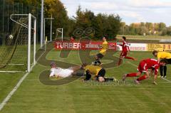 FC Wackerstein-Dünzing - Türk.SV Ingolstadt  - Zorlu Abdullah (rot knieend Türkisch) erziehlt den 1:1 Ausgleichstreffer Torwart  Koestler Thomas (Wackerstein) - Foto: Jürgen Meyer