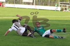 Lottocup 2014 - Türkisch SV Ingolstadt - TSV Jetzendorf 5:0 - Ali Erbas setzt sich gegen den Jetzendorfer Torwart Georg Weimer durch und wird danach vom Verteidiger gestoppt. Umstrittene Situation da der Jetzendorfer David Vohberger  den Ball mit dem Arm 