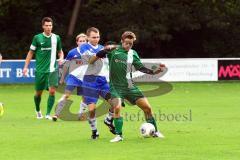 Bezirksliga Oberbayern Nord - SV Manching - FC Etting - Ferdinand Heissler (li) im Zweikampf mit Tobias Vincenti. Foto: Adalbert Michalik