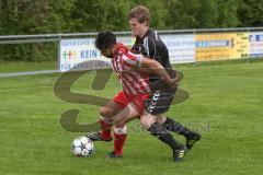 Kreisliga - TSV Baar Ebenhausen - FC Hepberg - Calik Sansar #10 rot Hepberg - Olbrich Lcas #6 schwarz Baar-Ebenhausen - Foto: Jürgen Meyer