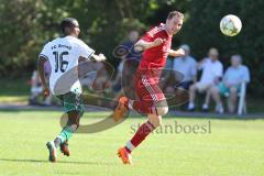 Fußball Bezirksliga - TSV Baar/Ebenhausen - TSV Erding -  Alexander Mack rot Baar/Ebenhausen - David Williams weiß Erding - Foto: Jürgen Meyer