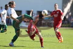 Fußball Bezirksliga - TSV Baar/Ebenhausen - TSV Erding -  Nico Kreitmayr rot Baar/Ebenhausen - Ibrahim Aydemir weiß Erding - Foto: Jürgen Meyer