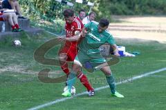 Bezirksliga - TSV Baar/Ebenhausen - TSV Jetzendorf - Markus Bals rot Baar/Ebenhausen - Martin Schröder grün Jetzendorf -  Foto: Jürgen Meyer