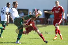 Fußball Bezirksliga - TSV Baar/Ebenhausen - TSV Erding -  Nico Kreitmayr rot Baar/Ebenhausen - Ibrahim Aydemir weiß Erding - Foto: Jürgen Meyer