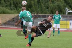 Kreisliga - TSV Gaimersheim - FC Geisenfeld - Patrick Valentin grün Geisenfeld - Peter Dörfler schwarz Gaimersheim -  Foto: Jürgen Meyer