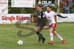 Kreisliga - Türk SV Ingolstadt - TSV Gaimersheim - Ugur Genc weiss Türk SV - Dennis Huettinger schwarz Gaimersheim - Foto: Jürgen Meyer