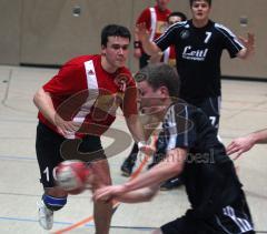 Handball - MTV Ingolstadt - Eggenfelden - Peter Mesiarik jun. blockt einen Angriff