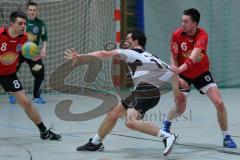 Handball - MTV Ingolstadt - SC Freising - rechts (6) Martin Toennies versucht den Gegner zu stoppen und links Alexander Geier