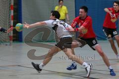 Handball - MTV Ingolstadt - SC Freising - rechts (6) Martin Toennies versucht den Gegner zu stoppen