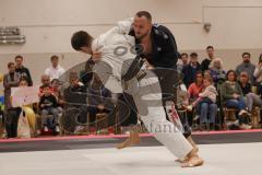 Judo - 2. Bundesliga - Männer - Saison 2024/25 - Judo - ESV Ingolstadt - Rüsselsheim-  - Nikos Moulatze schwarz ESV - Daniel Goral weiss Rüsselsheim - Foto: Meyer Jürgen