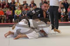 Judo - 2. Bundesliga - Männer - Saison 2024/25 - Judo - ESV Ingolstadt - Rüsselsheim-  - Nicos Moulatze schwarz ESV - Florian Birk weiss Rüsselsheim - Foto: Meyer Jürgen