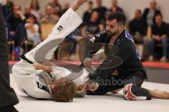 Judo - 2. Bundesliga - Männer - Saison 2024/25 - Judo - ESV Ingolstadt - Rüsselsheim-  - Tsanidis Dimitros schwarz ESV - Jaron Ivanov weiss Rüsselsheim - Foto: Meyer Jürgen