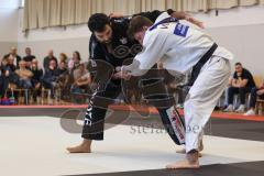 Judo - 2. Bundesliga - Männer - Saison 2024/25 - Judo - ESV Ingolstadt - Rüsselsheim-  - Mohamed Montassar Rouahi schwarz ESV -  - Nils Faßmann weiss Rüsselsheim - Foto: Meyer Jürgen