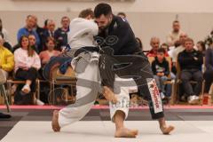 Judo - 2. Bundesliga - Männer - Saison 2024/25 - Judo - ESV Ingolstadt - Rüsselsheim-  - Tsanidis Dimitros schwarz ESV - Jaron Ivanov weiss Rüsselsheim - Foto: Meyer Jürgen