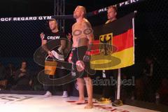 MMA - Young Blood Night - YBN Championship -77 kg - MARIO WITTMANN Ingolstadt gegen VLADIMIR FEDIN aus St. Petersburg, Russland - Urteil No Contest nach angeblichen Tiefschlag - Nationalhymne vor dem Kampf - links Trainer Gentian Morina