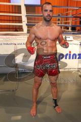 Kickboxen - Herren K1 bis 81 Kg - Novak Luca rote Hose  - Kickboxtempel Ingolstadt - Sieger gegen Dzhgiulin Danill  - Sparta München schwarze Hose - Foto: Jürgen Meyer