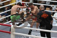 Kickboxen - Deutsche Meisterschaft Pro Amateure Jugend K1-70 Kg - rote Hose Vass Christopher vom Kickboxtempel Ingolstadt - grüne Hose Safaridis Kostas von Kampfschule Sparte München - Foto: Jürgen Meyer
