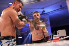 Stekos Fight Night - Postpalast - Kickboxen - Boxen - K1 - WKU WM - Thaiboxen - Michale Smolik (GER) weisse Handschuhe gegen Enver Sljivar (SUI), Sieger Smolik