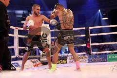 Stekos Fight Night - Postpalast - Kickboxen - Boxen - K1 - WKU Weltmeisterschaft Thaiboxen - Titelverteidiger Dardan David Morina (GER) weisse Handschuhe gegen Kamon Chetphaophan (THA), schwarze Handschuhe, Sieger Morina