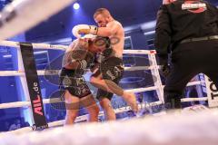 Stekos Fight Night - Postpalast - Kickboxen - Boxen - K1 - WKU Weltmeisterschaft Thaiboxen - Titelverteidiger Dardan David Morina (GER) weisse Handschuhe gegen Kamon Chetphaophan (THA), schwarze Handschuhe, Sieger Morina