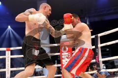 Stekos Fight Night - Postpalast - Kickboxen - Boxen - Nika Nakashidze (Geo) (rote Hose) gegen Bojan Aladzic (GER) schwarze Hose, Boxkampf, Sieger Aladzic