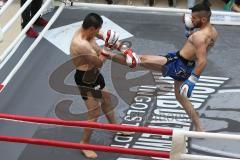Kickboxen - WM Kampf ISKA - K1 - 59 Kg - blaue Hose Herrausforderer Szajko Jan vom Kickboxtempel Ingolstadt - schwarze Hose amtierender Weltmeister Hosseini Qurban vom Iron Fist Gym Vienna - Foto: Jürgen Meyer