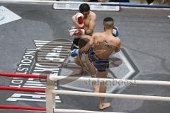 Kickboxen - WM Kampf ISKA - K1 - 59 Kg - blaue Hose Herrausforderer Szajko Jan vom Kickboxtempel Ingolstadt - schwarze Hose amtierender Weltmeister Hosseini Qurban vom Iron Fist Gym Vienna - Foto: Jürgen Meyer
