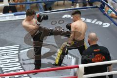 Kickboxen - Deutsche Meisterschaft Pro Amateure Jugend VK-48 Kg - schwarze Hose Homer Richard vom Kickboxtempel Ingolstadt - gelbe Hose Mezineler Kerem Can von Team Sharks Sindelfingen - Foto: Jürgen Meyer