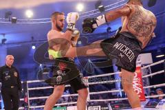 Stekos Fight Night - Postpalast - Kickboxen - Boxen - K1 - WKU Weltmeisterschaft Thaiboxen - Titelverteidiger Dardan David Morina (GER) weisse Handschuhe gegen Kamon Chetphaophan (THA), schwarze Handschuhe, Sieger Morina