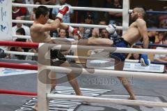 Kickboxen - WM Kampf ISKA - K1 - 59 Kg - blaue Hose Herrausforderer Szajko Jan vom Kickboxtempel Ingolstadt - schwarze Hose amtierender Weltmeister Hosseini Qurban vom Iron Fist Gym Vienna - Foto: Jürgen Meyer