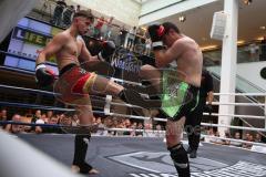 Kickboxen - Deutsche Meisterschaft Pro Amateure Jugend K1-70 Kg - rote Hose Vass Christopher vom Kickboxtempel Ingolstadt - grüne Hose Safaridis Kostas von Kampfschule Sparte München - Foto: Jürgen Meyer