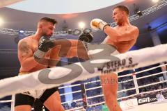 Stekos Fight Night - Postpalast - Kickboxen - Boxen - K1 - WKU WM Weltmeisterschaft - Robin Wildhaber (SUI) (schwarze Handschuhe) gegen Titelverteidiger Sebastian Preuss (GER) goldene Handschuhe, Sieger Preuss