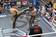 Kickboxen - Deutsche Meisterschaft Pro Amateure Jugend VK-48 Kg - schwarze Hose Homer Richard vom Kickboxtempel Ingolstadt - gelbe Hose Mezineler Kerem Can von Team Sharks Sindelfingen - Foto: Jürgen Meyer