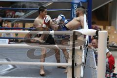Kickboxen - WM Kampf ISKA - K1 - 59 Kg - blaue Hose Herrausforderer Szajko Jan vom Kickboxtempel Ingolstadt - schwarze Hose amtierender Weltmeister Hosseini Qurban vom Iron Fist Gym Vienna - Foto: Jürgen Meyer