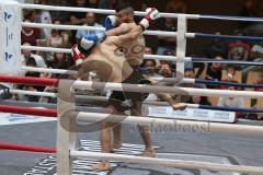 Kickboxen - WM Kampf ISKA - K1 - 59 Kg - blaue Hose Herrausforderer Szajko Jan vom Kickboxtempel Ingolstadt - schwarze Hose amtierender Weltmeister Hosseini Qurban vom Iron Fist Gym Vienna - Foto: Jürgen Meyer