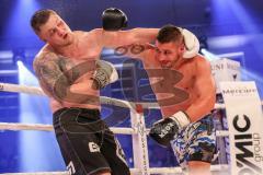 Stekos Fight Night - Postpalast - Kickboxen - Boxen - K1 - WKU WM - Thaiboxen - Michale Smolik (GER) weisse Handschuhe gegen Enver Sljivar (SUI), Sieger Smolik