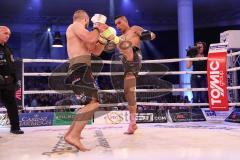 Stekos Fight Night - Postpalast - Kickboxen - Boxen - K1 - WKU Weltmeisterschaft Thaiboxen - Titelverteidiger Dardan David Morina (GER) weisse Handschuhe gegen Kamon Chetphaophan (THA), schwarze Handschuhe, Sieger Morina