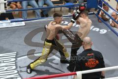Kickboxen - Deutsche Meisterschaft Pro Amateure Jugend VK-48 Kg - schwarze Hose Homer Richard vom Kickboxtempel Ingolstadt - gelbe Hose Mezineler Kerem Can von Team Sharks Sindelfingen - Foto: Jürgen Meyer