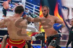 Steko´s Fight Night - WKU Weltmeisterschaft - K1, bis 76 Kg, Titelverteidiger Dardan Morina (Ingolstadt, schwarze Hose) gegen Vladimir Konsky (SVK, schwarz-rote Hose), Sieger Dardan Morina nach Punkten. Morina schlägt ihn hier zu Boden