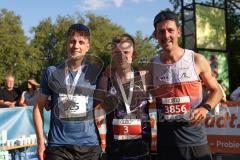 Halbmarathon 2026 - Halbmarathon 2026  - Chris Göltl #3 MTV Ingolstadt - 1. Sieger - im Zieleinlauf - Andreas Wittmann #3856 - Roots Performance 2. Sieger - Heinrich Andreas #325 - 3. Sieger - Foto: Meyer Jürgen