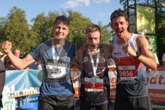Halbmarathon 2026 - Halbmarathon 2026  - Chris Göltl #3 MTV Ingolstadt - 1. Sieger - im Zieleinlauf - Andreas Wittmann #3856 - Roots Performance 2. Sieger - Heinrich Andreas #325 - 3. Sieger - Foto: Meyer Jürgen