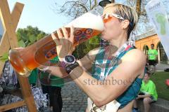 Halbmarathon Ingolstadt 2014 - Die Siegerin Tina Fischl aus Passau im Ziel