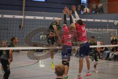 Volleyball - Saison 2026/27 - Donauholz Volleys Ingolstadt - SC Freising - Holcik Michal schwarz Donauholz Volleys #12 - Blattenberger Johannes pink Freising #5  Winter Maximilian pink Freising #10 -  Foto: Meyer Jürgen