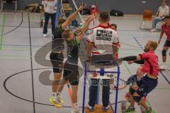 Volleyball - Saison 2026/27 - Donauholz Volleys Ingolstadt - SC Freising - Wasilewski Carl schwarz Donauholz Volleys #10 - Holcik Michal schwarz Donauholz Volleys #12 -  Blattenberger Johannes pink Freising #5 Foto: Meyer Jürgen